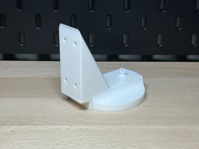 The mount from the side: wall plate and round rest at a right angle