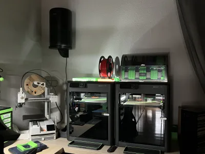 A look into the workshop: the air purifier hangs at the upper left above the two printers
